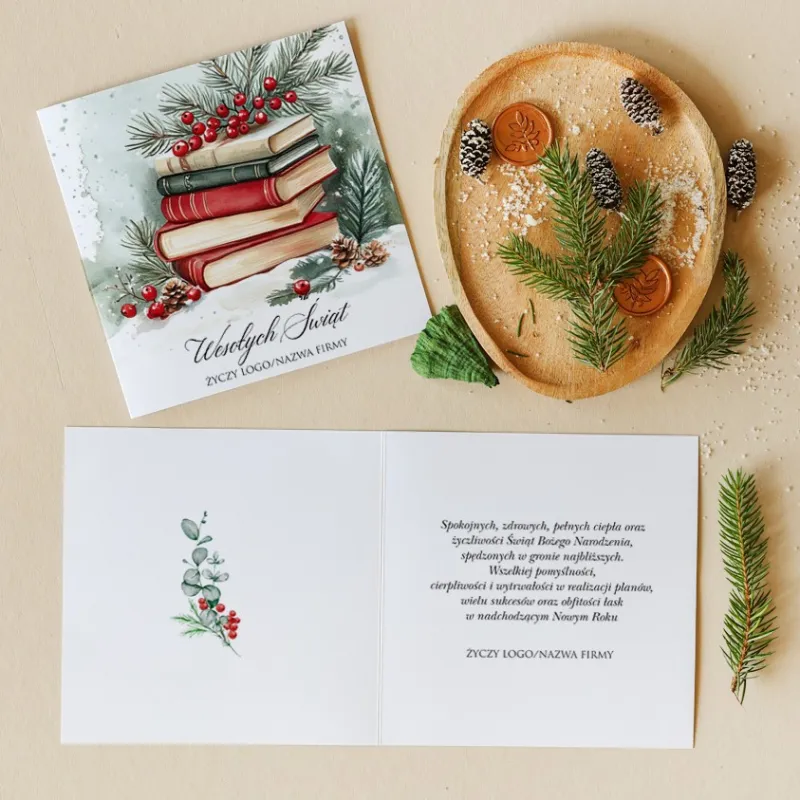 Kartka świąteczna z ilustracją stosu beżowo-czerwonych książek, gałązek świerkowych i czerwonych jagód Kartka świąteczna z ilustracją stosu beżowo-czerwonych książek, gałązek świerkowych i czerwonych jagód